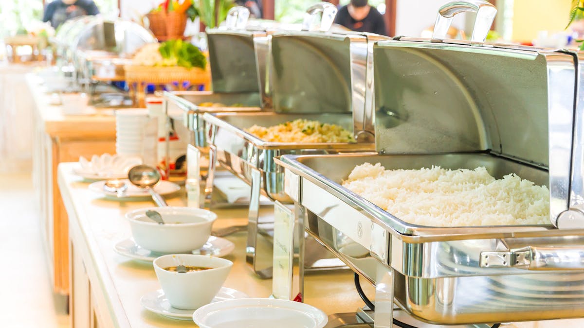 a person cooking food on a table